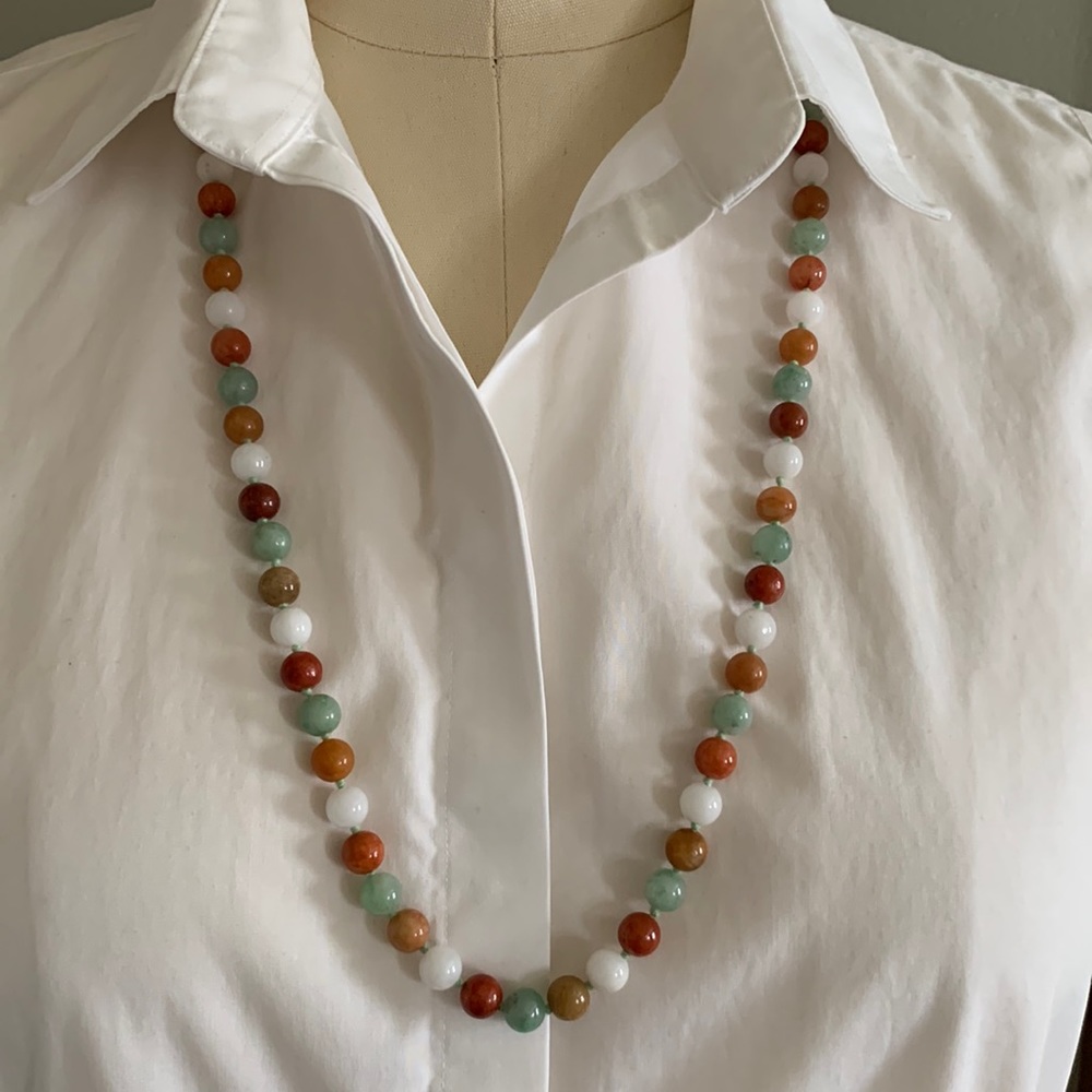 Multicolored Jade necklace on a 30 inch knotted strand with a lobster claw clasp